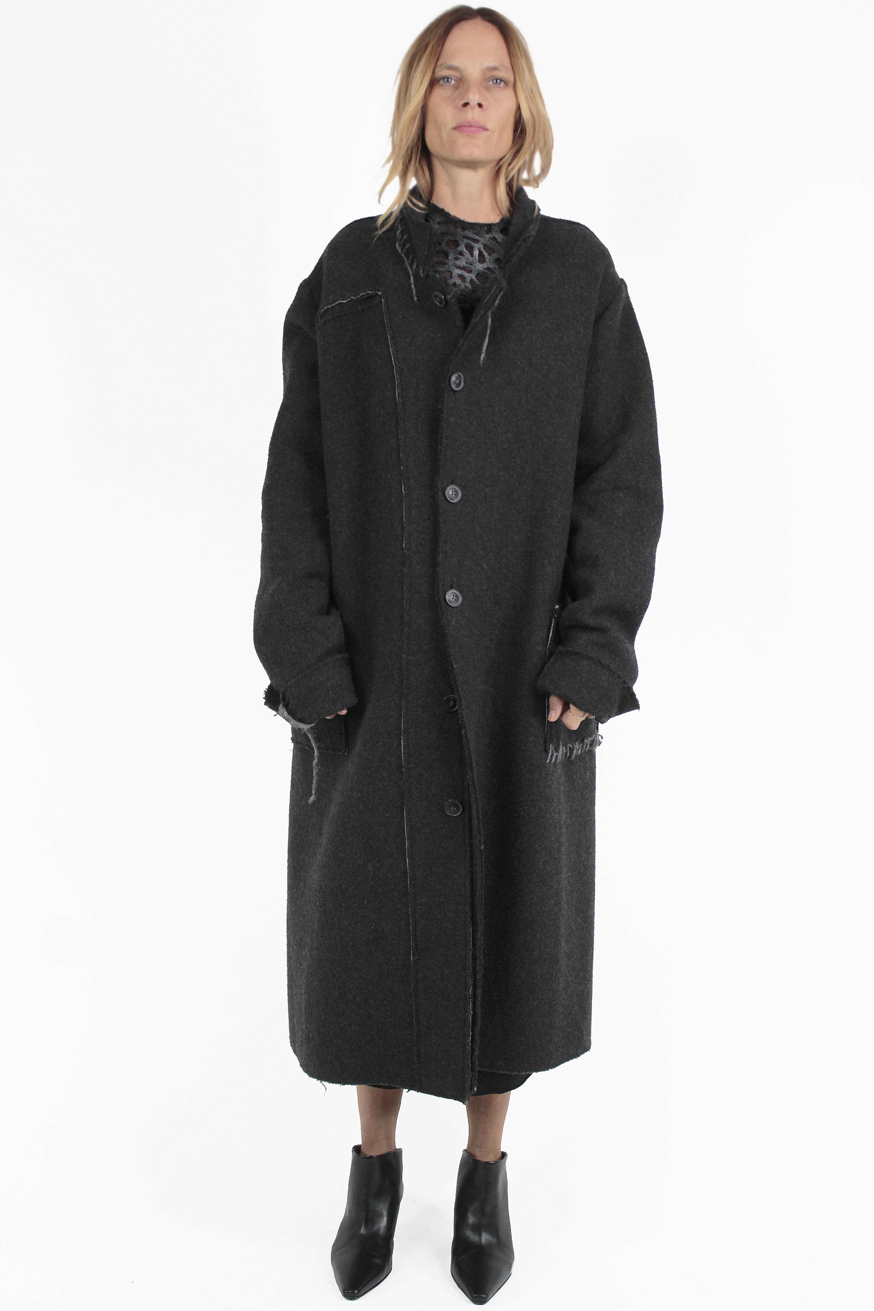 UN-NAMABLE MANTEL Breaking Raw Overcoat